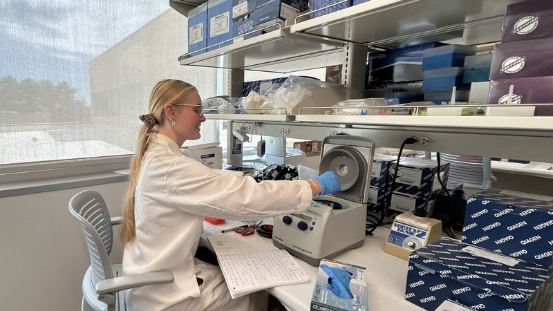 A scientist working in a lab.