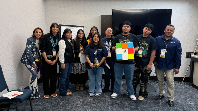 People in a group photo.