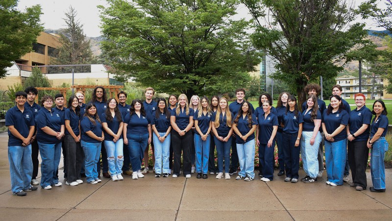 A group photo of dozens of Utah State students.