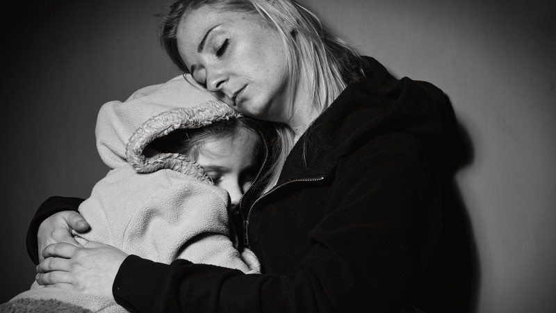 A mother and a child.