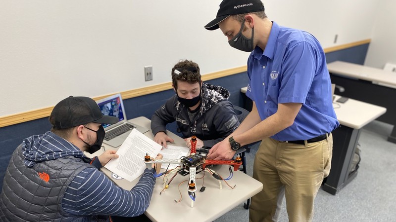 USU students work on a drone.