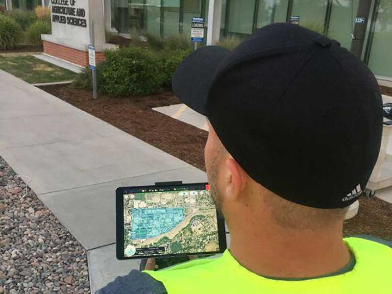Hunter Buxton piloting a UAV.