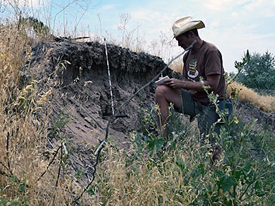 USU geologist Joel Pederson conducting field work at the Bear River massacre site