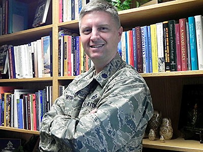Lt.Col. Steven Smith, director of USU's Air Force ROTC in an office
