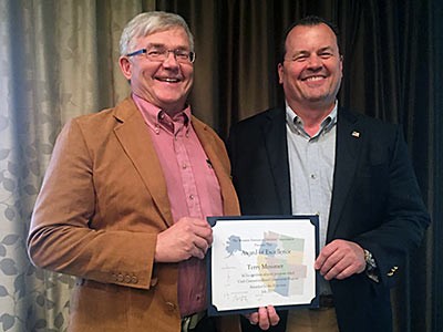 USU professor Terry Messmer and Vice President and Dean Ken White