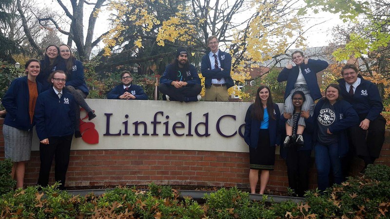 Utah State University’s Speech and Debate Team pose for a photo at Linfield College.
