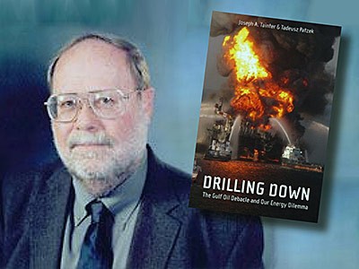 USU professor Joseph Tainter with his book