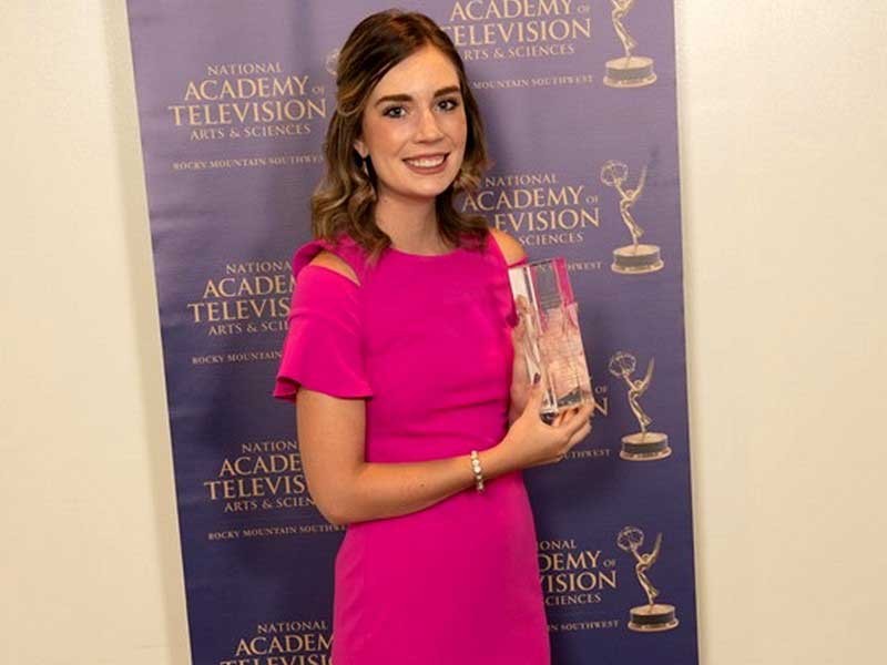 Ayanna Likens holding her student Emmy
