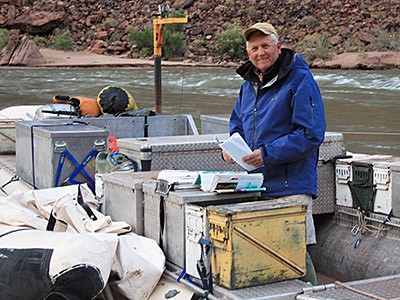 USU professor Jack Schmidt aboard a boat on the Colorado River