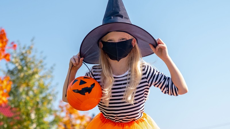 Young girl in a Halloween costume.