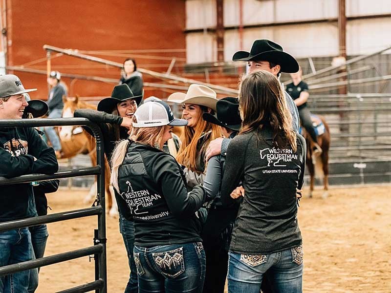 Members of USU’s Western Equestrian Team taking a break