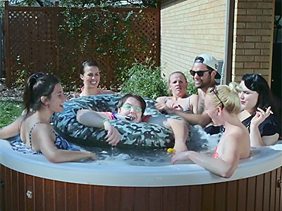 USU actors in a hot tub for video on cybercrime