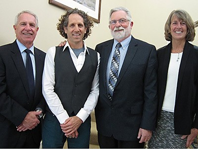 Inaugural professor Jim Rogers and USU administrators at his lecture