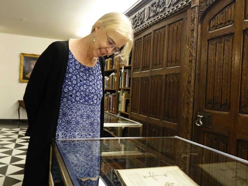 English professor Phebe Jensen with her exhibit