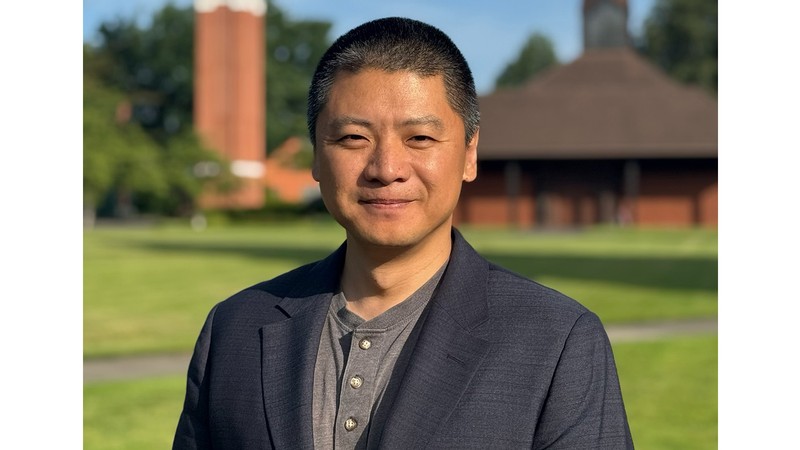 USU Blanding AVP Ken Guan poses in sports coat