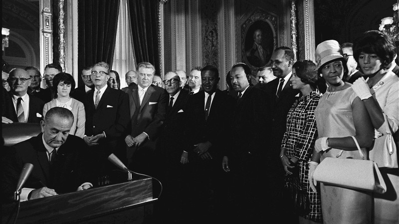 U.S. President Lyndon B. Johnson signing the Voting Rights Act of 1965 on August 6, 2965.