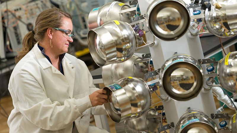 Uintah Basin biology student Makenzie Holmes prepares air samples to be analyzed in the lab.