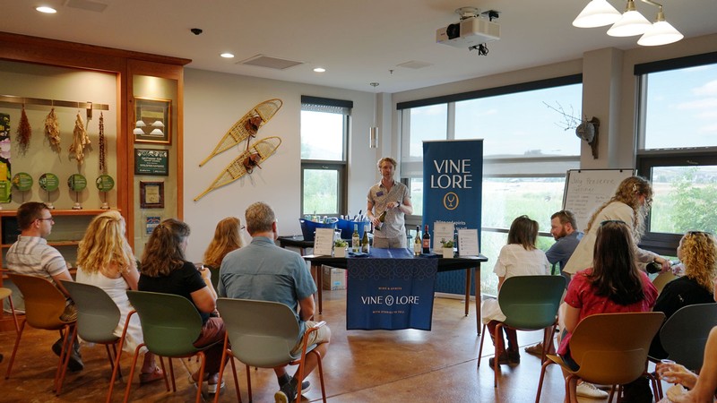 People attending a wine tasting at the Swaner EcoCenter.