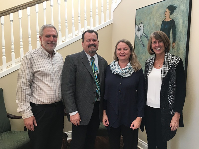 Dirk Vanderwall, Ken White, Irina Polejaeva and USU President Noelle Cockett