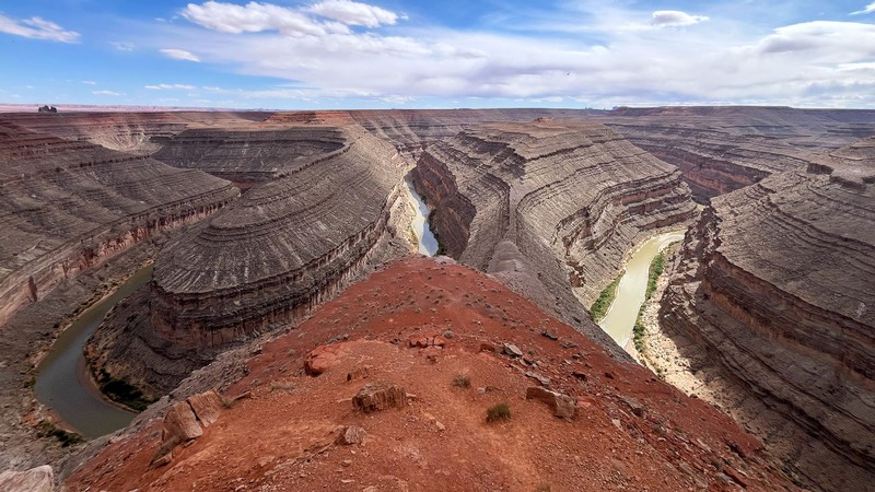 A river winding through a redrock canyon.