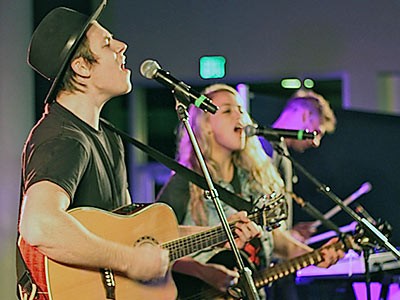 a band performing onstage