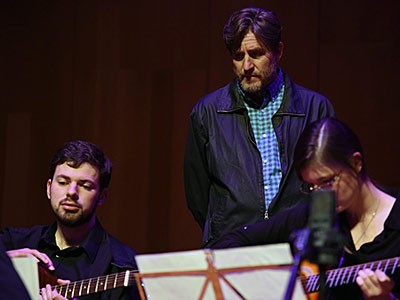 Corey Christiansen with USU guitar students
