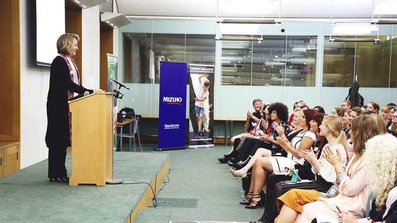 Susan Madsen speaks to an audience.