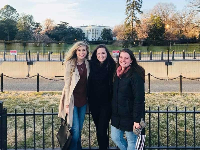 Vivien Burnell in front of the White House