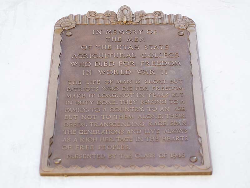 USU historic plaque dedicated to those who served during WWII.