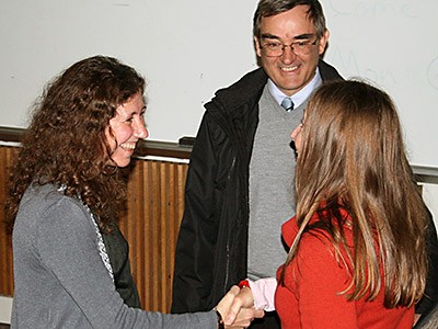 Physicists Gabriela González and Jan Sojka greet USU guest