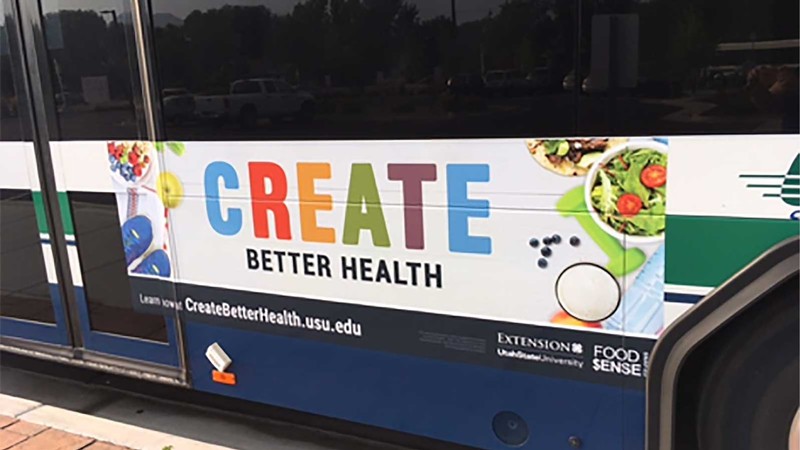 Create Better Health billboard on the side of a bus.