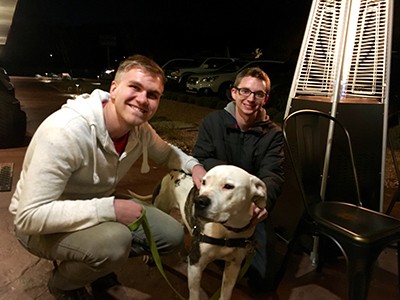 USU students pose with dog
