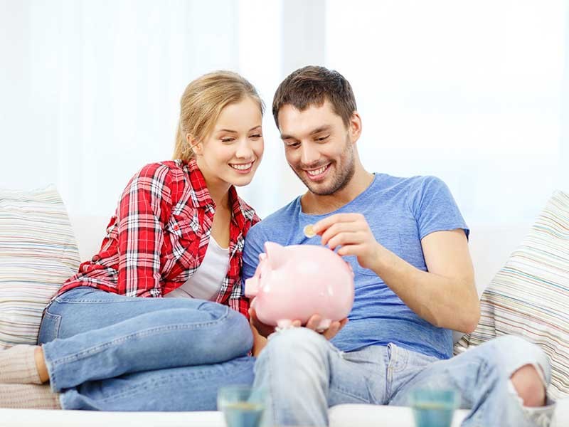 couple with a piggy bank
