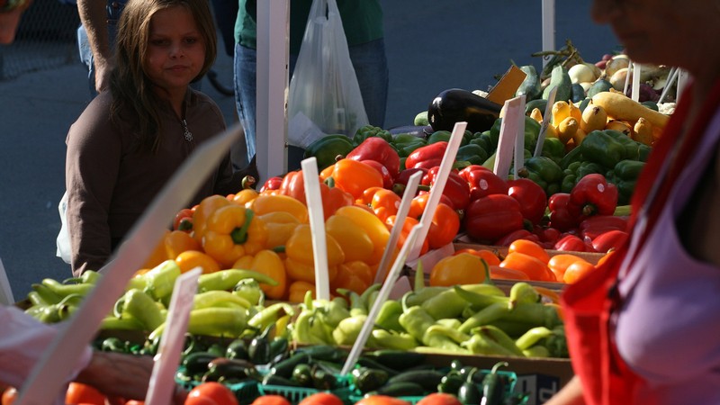 Farmer's market with a produce stand.