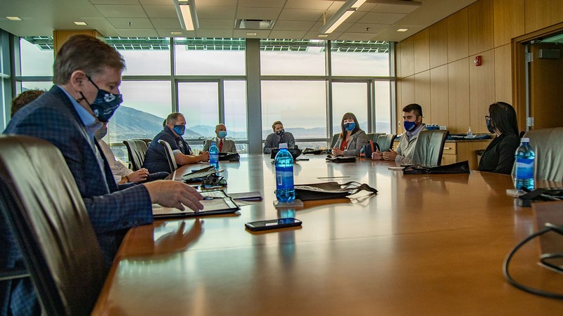people in a boardroom meeting.