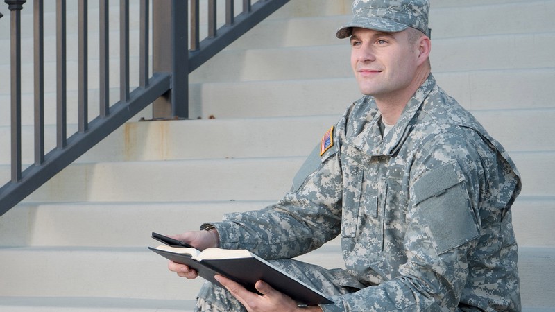 a veteran sitting on the steps.