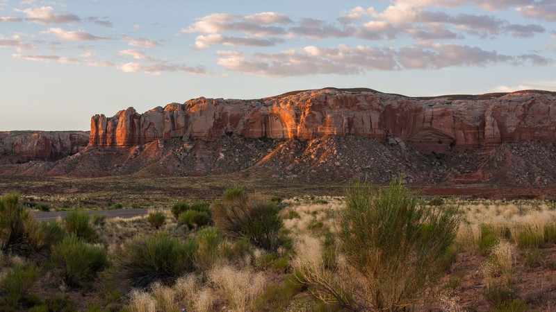 Red rock cliffs near the Navajo Nation and White Mesa Ute reservations.
