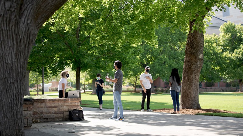 USU students walking on campus.