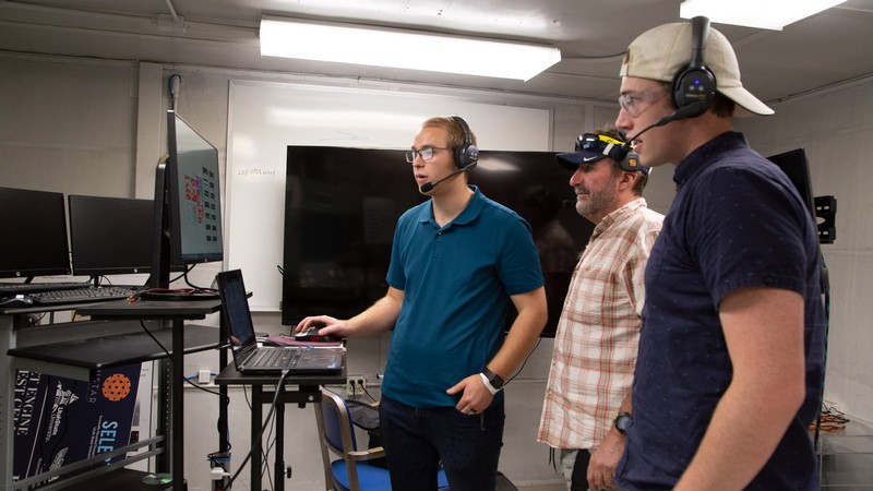 Whitmore with master’s student Kurt Olsen (left) and sophomore Parker Forster.