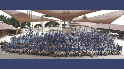 Hundreds of Boston Scientific employees pose for a photograph in Arden Hills, Minnesota.