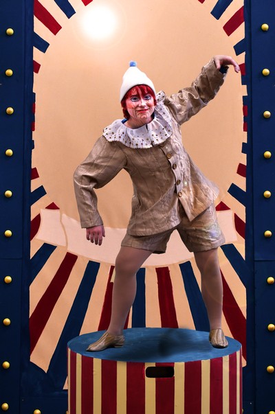An actor dressed as Pinocchio.