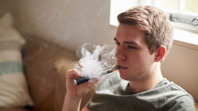 A person vaping.