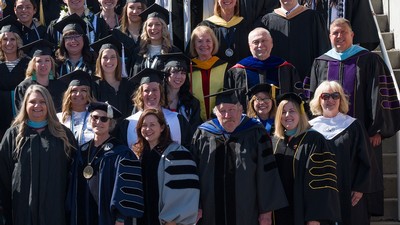 People in academic robes.
