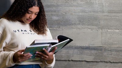 A person reading books.