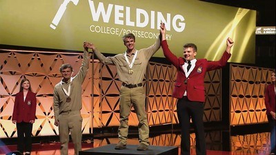 People standing on a winner's podium.