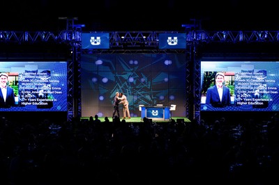 People standing on a stage.