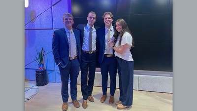 Four business students.