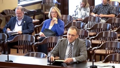Seth Lyman in a government meeting.