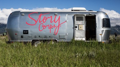 An Airstream trailer with "Story Corps" written on the side.