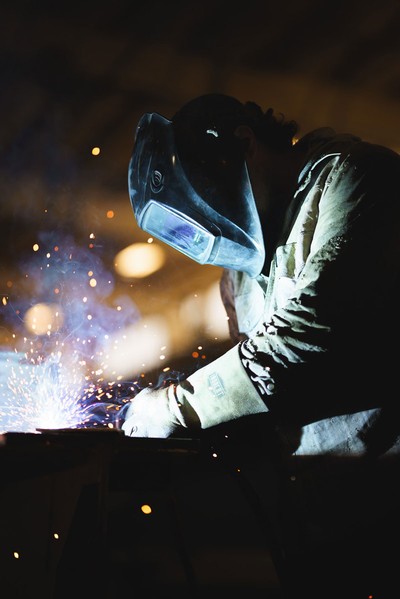 A person welding.